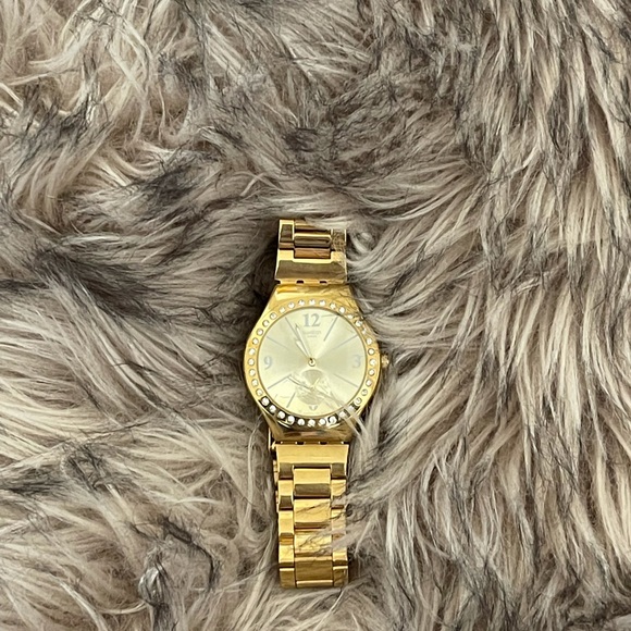 swatch brand watch.  Golden colour - Picture 7 of 8